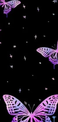 This phone live wallpaper features a captivating display of fluttering butterflies against a black sky filled with twinkling stars