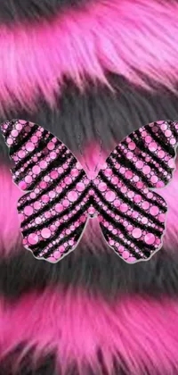 This live wallpaper showcases a stunning pink and black butterfly perched gracefully upon a soft, furry art background