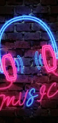 Enhance your phone's appearance with this stunning live wallpaper featuring a neon sign with headphones on it