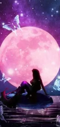 Unleash your fantasy side with this mesmerizing live wallpaper! A woman gracefully seated on a sailing boat, with pink moon shining brightly in the night sky, sets the perfect ambiance backed by a gorgeous fantasy aura