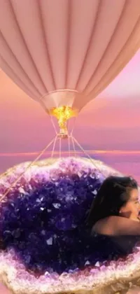 This phone live wallpaper showcases a stunning digital art of a woman floating in a hot air balloon, surrounded by surreal landscapes in vibrant colors and intricate details