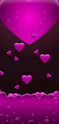 This phone live wallpaper features a stunning purple heart design surrounded by a variety of colorful bubbles, situated on a sleek black background