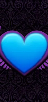 This phone live wallpaper features a stunning blue heart with majestic wings on a sleek black background