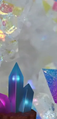 This live wallpaper features an abstract arrangement of crystals in various sizes and shapes, reflecting a rainbow of colors on top of a table