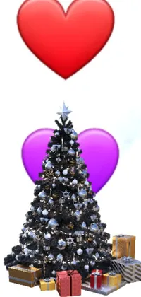 Get into the Christmas spirit with this phone live wallpaper! A beautiful and realistic Christmas tree decked out with presents and a heart takes center stage, while a stunning photo in shades of black and silver serves as the perfect backdrop
