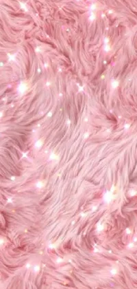 This kawaii-inspired phone live wallpaper boasts a delightful close-up of a fluffy pink blanket, complete with baroque elements and a glittery background for maximum visual appeal