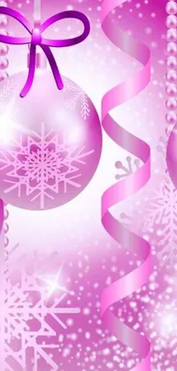 This phone live wallpaper showcases a charming pink Christmas ornament adorned with ribbons and delicate snowflakes
