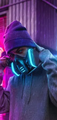 Looking for a cool and edgy live wallpaper for your phone? Check out this cyberpunk-inspired design featuring a man in a hoodie talking on a cell phone