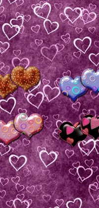 This phone live wallpaper features a playful design with bows and hearts on a purple background