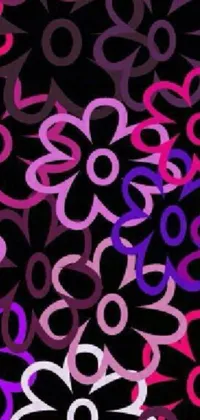 This live phone wallpaper features a stunning pattern of pink and purple flowers on a black background