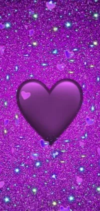 This phone live wallpaper features a stunning purple heart symbol set against a beautiful glittery purple background