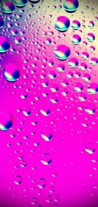 This live phone wallpaper features water droplets on a surface with flickr, synthwave color scheme, dithered magenta shades, soap bubble textures, and subtle glitter effects