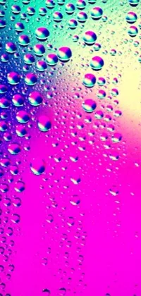 This phone live wallpaper showcases a stunning close-up of water droplets on a window, captured in a mesmerizing microscopic photo