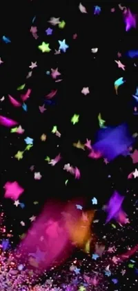 This phone wallpaper is a vibrant and cheery piece designed with an array of colorful confetti falling on a black background