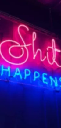 This dynamic phone live wallpaper showcases a neon sign that reads "shut happens"