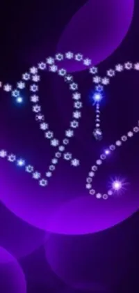 Download this stunning phone live wallpaper featuring a sparkling heart made of diamonds on a soothing purple background
