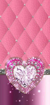 This stunning live wallpaper for your phone features a pink diamond heart on a pink background with accents of purple and pink leather garments