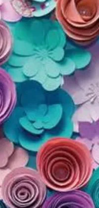 This phone live wallpaper depicts a close-up of exquisite paper flowers resting on a table