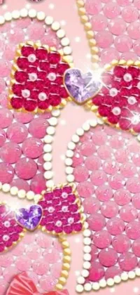 This phone live wallpaper features a pink background adorned with hearts and pearls that create a picturesque pattern
