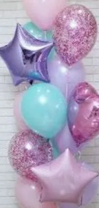 This live wallpaper is sure to add some cheer to your phone with its colorful balloons in shades of mauve and cyan