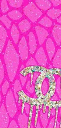 Elevate your phone's style with this striking live wallpaper featuring a pink phone case adorned with a sparkling eye design