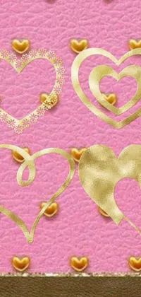 This live wallpaper features golden hearts arranged in various poses on a pink background with golden borders