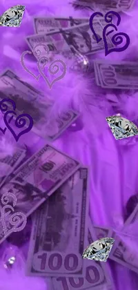 Get ready for the most luxurious and iconic phone live wallpaper that boasts a pile of green dollar bills sitting on a plush purple cloth