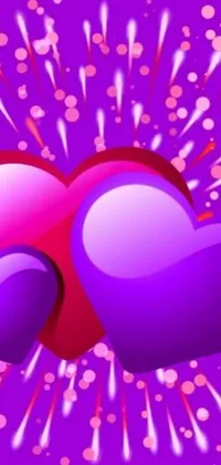 Get ready to give your phone a touch of romance with this beautiful live wallpaper! Featuring a charming pair of hearts on a stunning purple background, this wallpaper adds a romantic vibe and enhances your mobile's visual appeal
