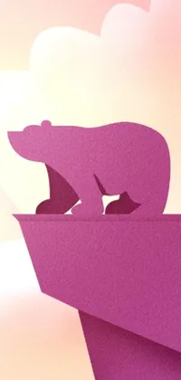 This live phone wallpaper features a magenta stylized silhouette of a polar bear standing on top of a cliff, bending down slightly
