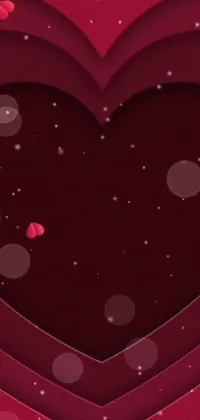 This phone live wallpaper boasts a gorgeous paper cut heart on a striking red backdrop