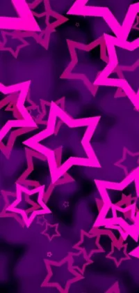 Get a dazzling live wallpaper for your phone with these pink stars on a purple background! This fun design features stars of various sizes and shapes that are sure to add a touch of whimsy and personality to your device