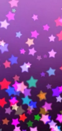 This phone live wallpaper features a bunch of colorful stars on a purple background, evoking a mesmerizing fantasy vibe
