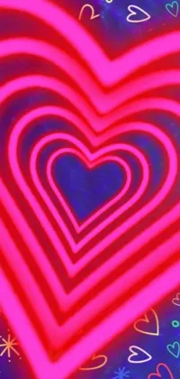 This phone live wallpaper features a vibrant toon-like heart surrounded by swirling pink neon lights on a striking blue background