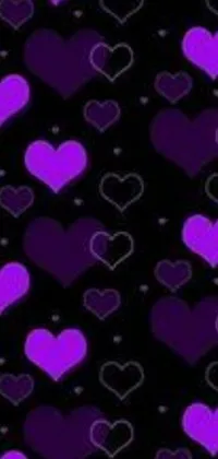 This live wallpaper displays lovely purple heart graphics on a black background, delivering a retro-style, tileable design for your phone screen