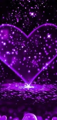 This stunning live wallpaper features a purple heart on a black background, adorned with neon sparkles for a modern and sleek look
