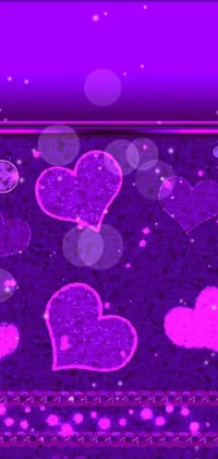 This phone live wallpaper features a stunning purple background with floating hearts and a glittery frame