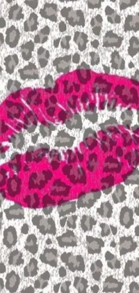 This magenta and gray phone live wallpaper features a digital rendering of a close-up pink lipstick on a leopard print background
