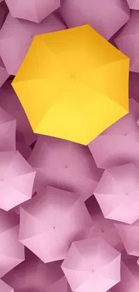 Brighten up your phone's home screen with this captivating yellow and pink umbrella phone live wallpaper