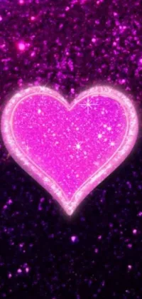 Express your love with this free phone live wallpaper featuring a pretty pink heart set against a beautiful purple background