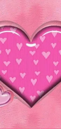 This girly live wallpaper features a beautiful pink heart on a gradient pink background