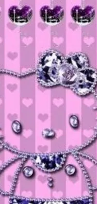 This adorable phone live wallpaper features a playful and bright hello kitty necklace and bracelet set on a lively pink background