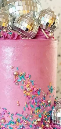Enhance your phone screen with this lively pink cake live wallpaper