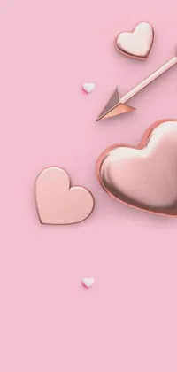 This phone live wallpaper showcases a pink background adorned with hearts, glitter accents, and a photorealistic rose gold heart in the center