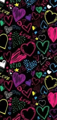 This phone live wallpaper features a bold and playful design with a black background adorned with hearts and stars, graffiti, chalk art, and vibrant clothing