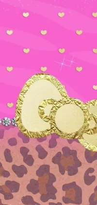 This phone live wallpaper showcases a shiny gold coin atop a soft pink background, complemented by sparkling jewels