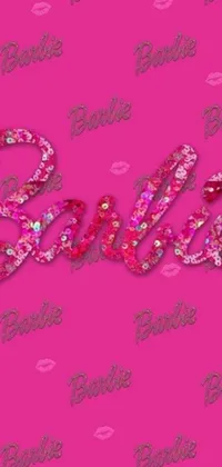 This fun and stylish phone live wallpaper features the iconic Barbie logo written in glitter on a pink background