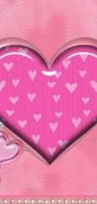 Add a pop of color and charm to your phone screen with this live wallpaper - a pink heart against a matching background