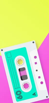 This phone live wallpaper features a colorful close-up image of a cassette on a pink and yellow background