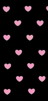 Add lively charm to your phone screen with this pink heart live wallpaper set against a mesmerizing black backdrop