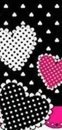 Looking for a stunning live wallpaper for your phone that's sure to impress? Look no further than this black and white cross stitch design with hot pink and black polka dots! Featuring a beautiful heart motif and sparkling shimmering gems to catch the eye, this easy-to-understand phone wallpaper is perfect for any occasion